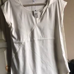 Express cream twist front blouse.